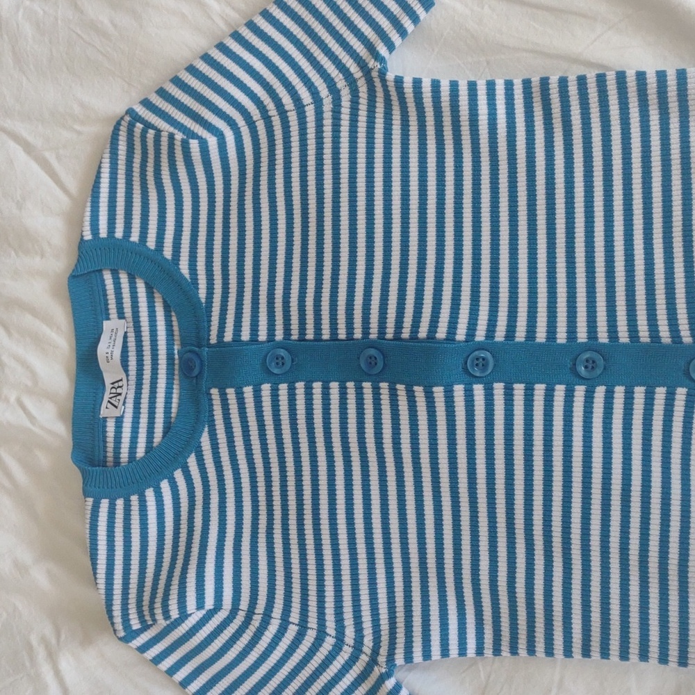 Blue and white knitted striped cropped top